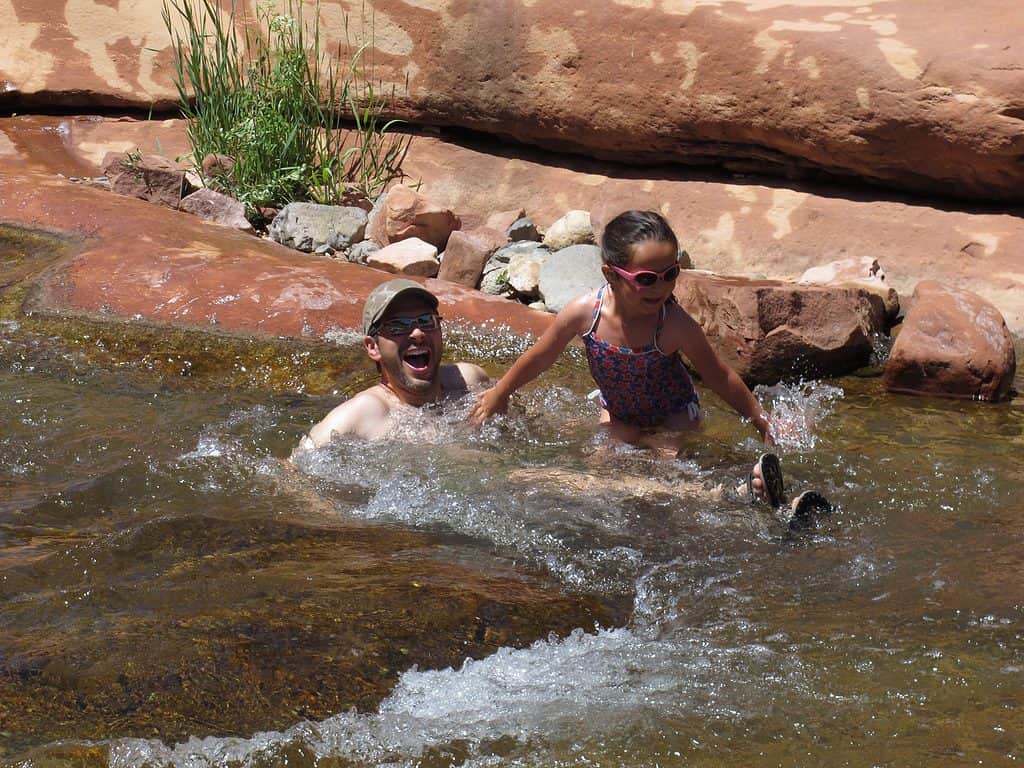 Swimming at Slide Rock State Park when looking for fun things to do in Sedona, Arizona