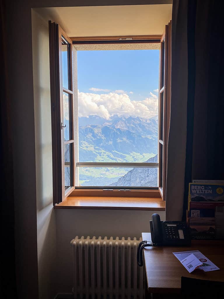 20220905 Anniversary 2267 LRE Web View of the Swiss Alps from a hotel room window at Hotel Pilatus Kulm.