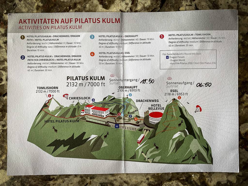 20220917 JK 1806 LRE Web Check-in card listing hiking activities and sunrise/sunset times at Hotel Pilatus Kulm.