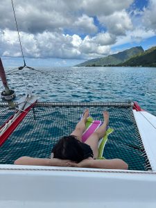 Relaxing on a catamaran in Tahiti
