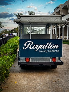 Resort golf cart for transporting luggage and people