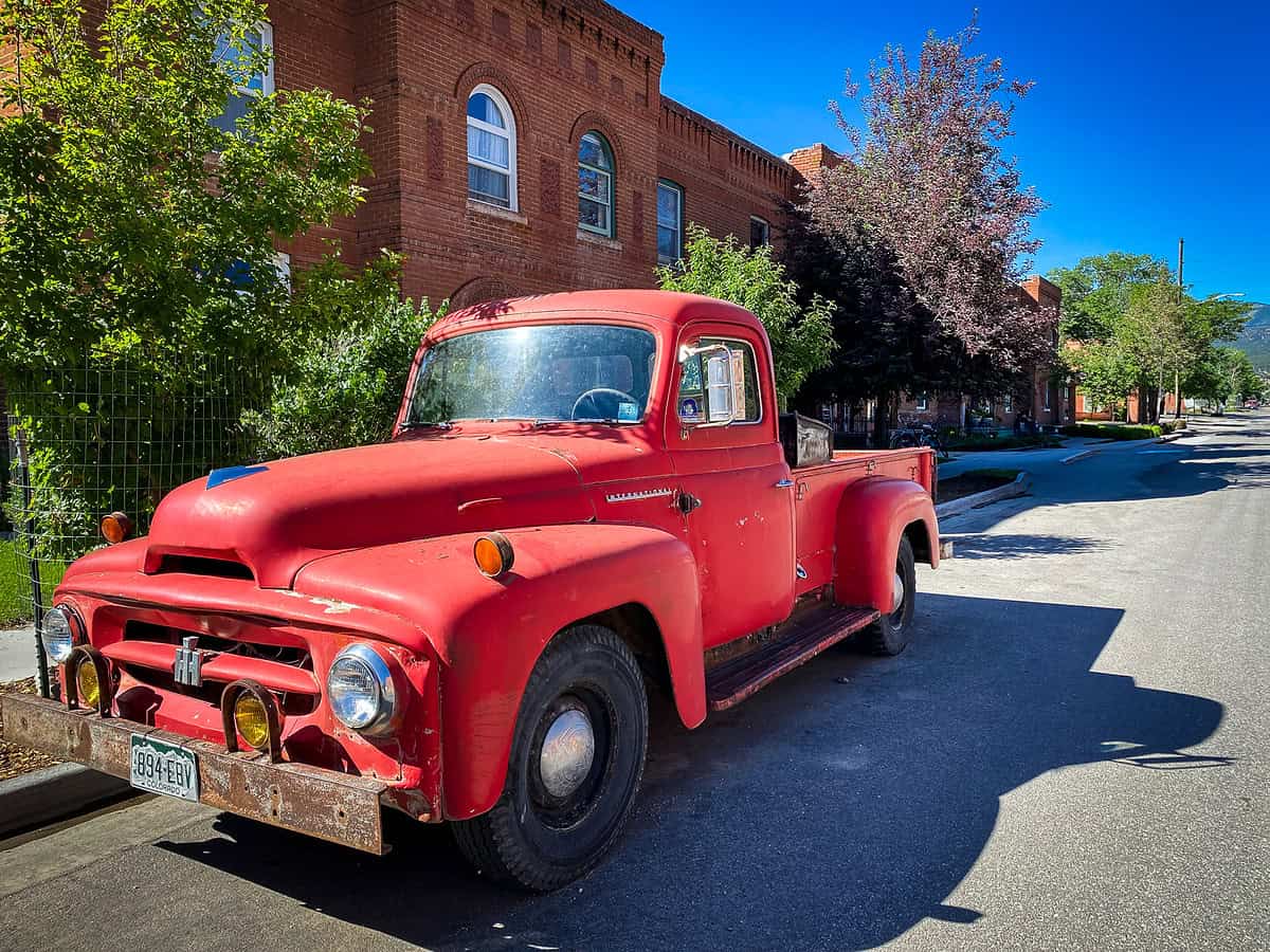 Outdoor adventures in Salida with an old red truck on the street.
