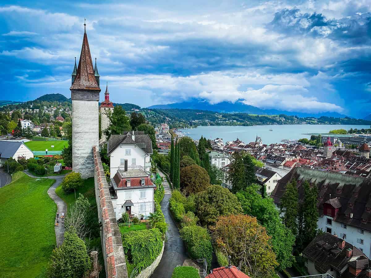 20220906 mostbeautifulswissvillages 1520 A historic Swiss village with medieval towers, hillside homes, and mountain views, perfect for a guide to most beautiful swiss villages.