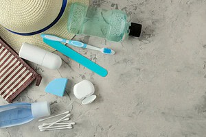 Toothbrush and essential toiletries for travel.