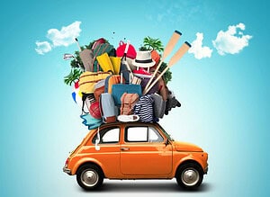 Gift ideas for travelers that they will actually use OR Overloaded car packed with luggage and travel gear representing overpacking mistakes
