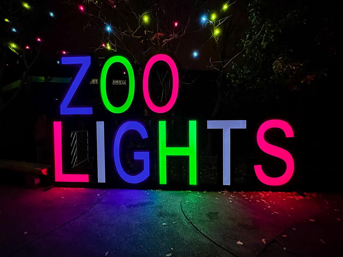 20251123 zoolights 8886 A colorful “Zoo Lights” sign glowing at night, perfect for a guide to Denver Zoo Lights in December.