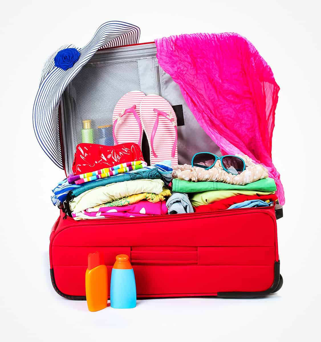 20120814 Panama Packing List 1003 Open suitcase packed with tropical travel essentials including flip‑flops, a sunhat, lightweight clothing, and toiletries for knowing what to pack for Panama.