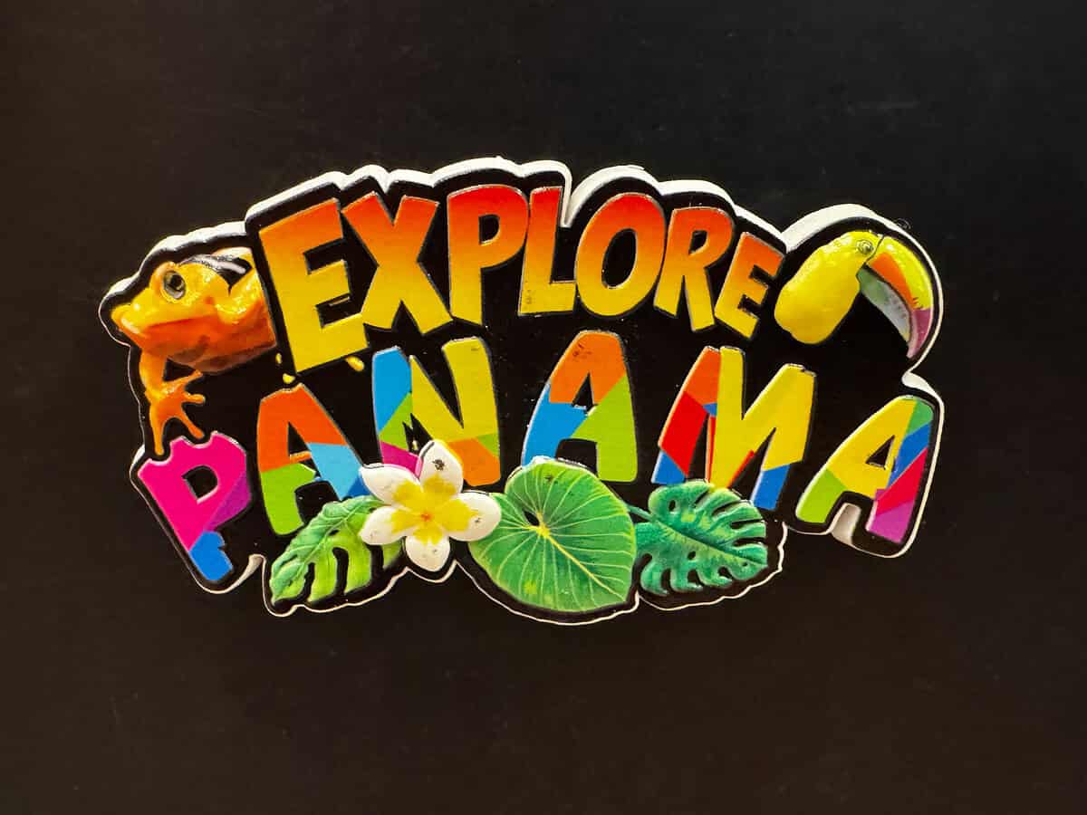 20260125 Panama 9501 Colorful “Explore Panama” graphic with tropical leaves, a toucan, a yellow frog, and bold multi-colored lettering on a black background.