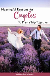 A couple holding hands while running through a lavender field, illustrating meaningful reasons couples should travel together.