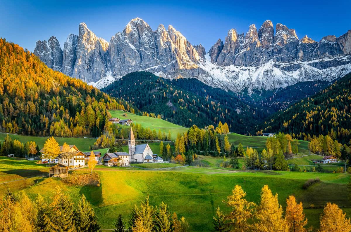20151030 plannningadolomiteshikingtrip 6 Santa Maddalena village beneath the snow-capped Odle mountains while planning a Dolomites hiking trip.