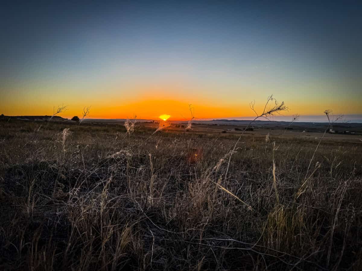 Golden sunset over the eastern Colorado prairie near the Paint Mines Interpretive Park.