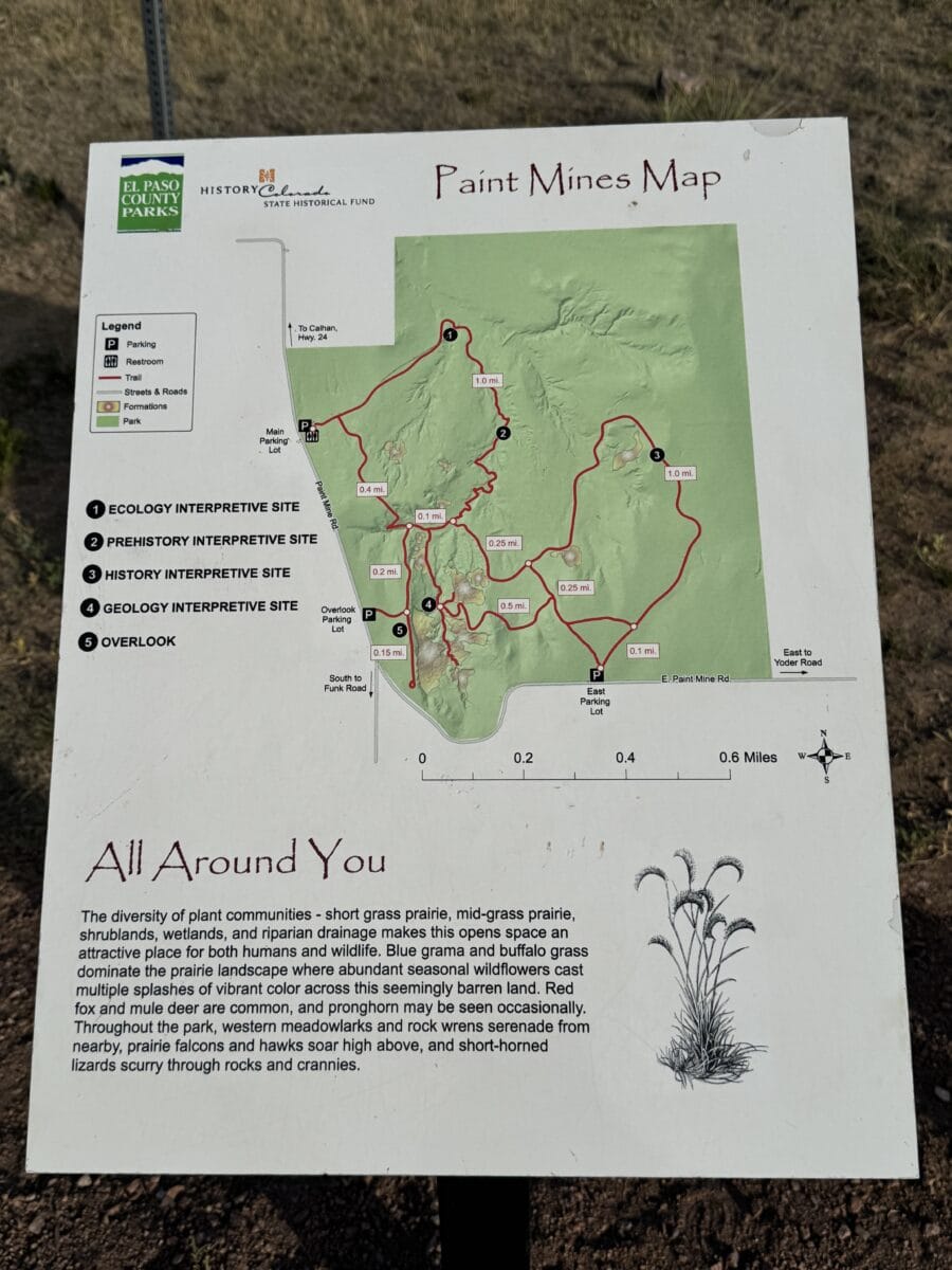 Trail map for Paint Mines Interpretive Park showing five interpretive sites, three parking lots, and trail distances in El Paso County, Colorado.