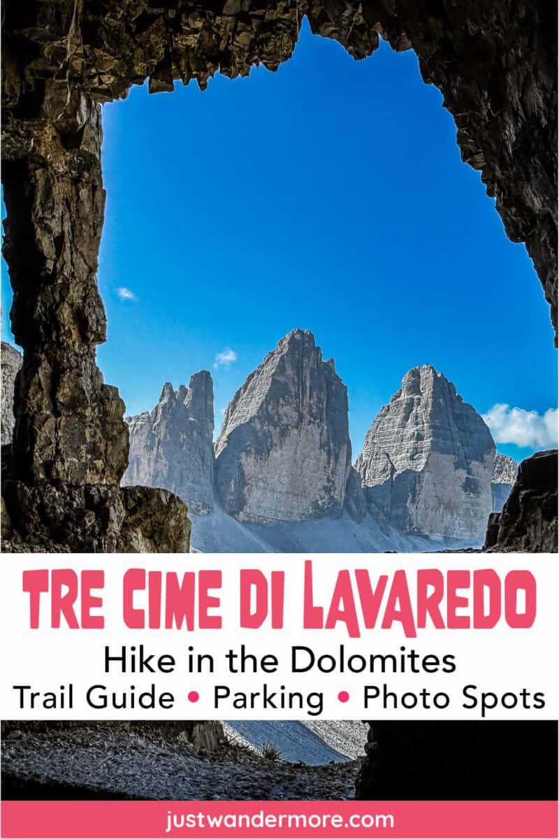 Tre Cime di Lavaredo peaks framed by a WWI tunnel window in Monte Paterno on the Tre Cime di Lavaredo hike in the Dolomites.